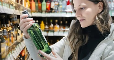 woman shopping for rare liquors