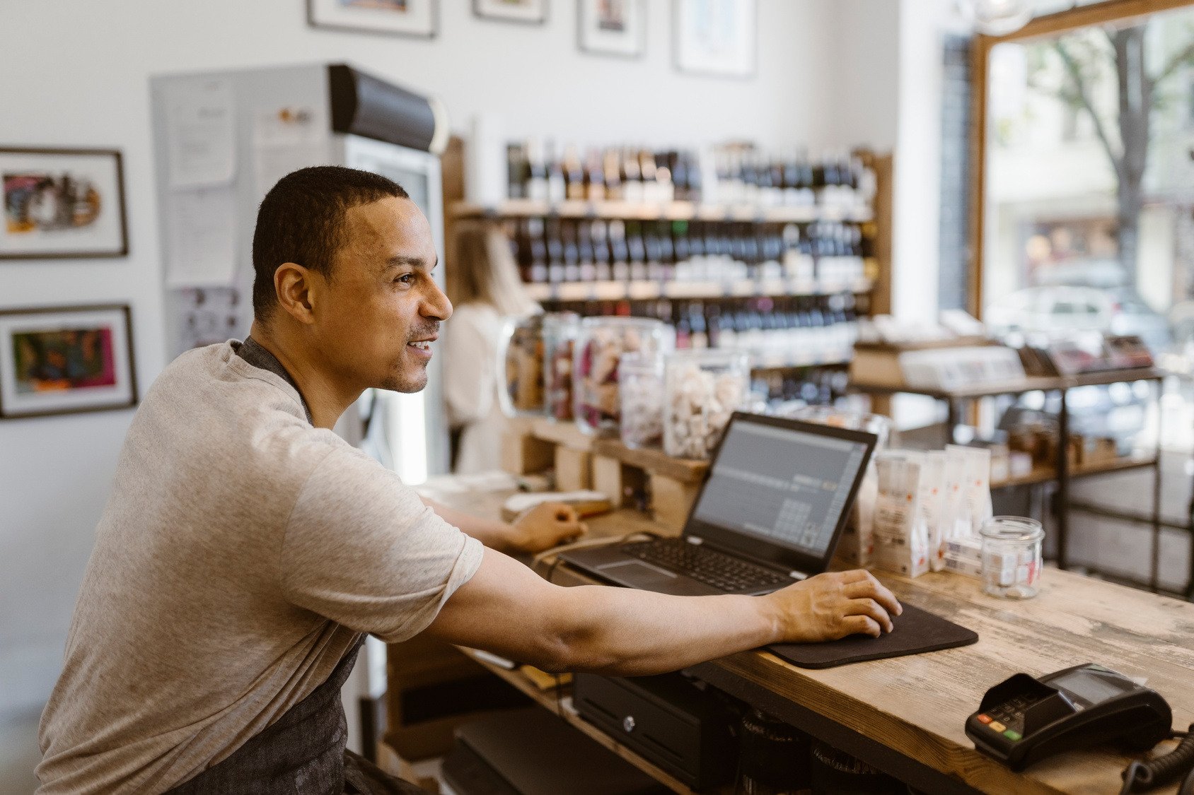 person using point of sale system